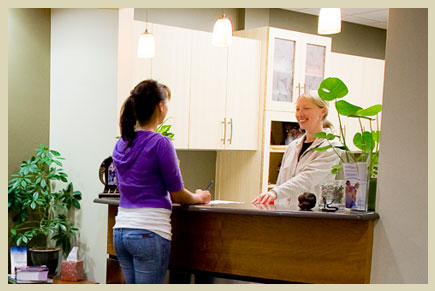 A patient being greeted at Natural Smiles Dentistry